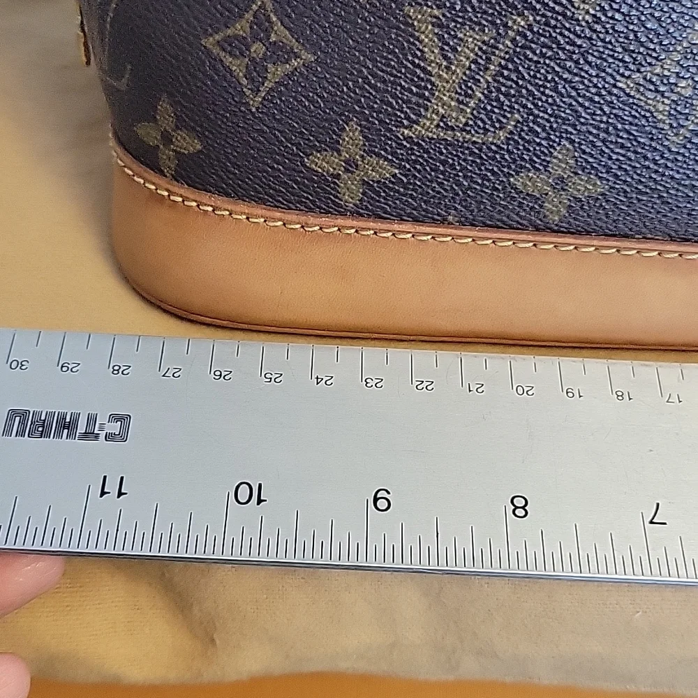 LOUIS VUITTON Alma monogram - Picture 11 of 16